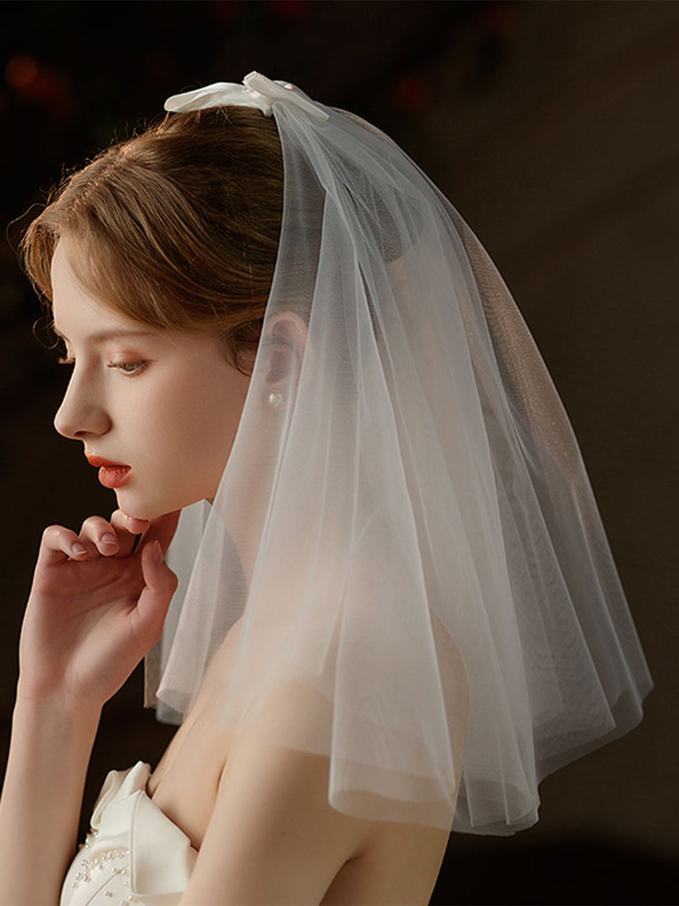 Voile de mariée blanc avec nœud vintage