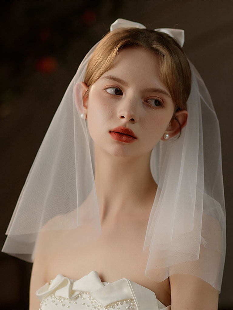 Voile de mariée blanc avec nœud vintage