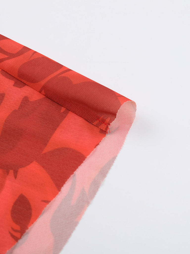 Robe rouge fleurs à bretelles spaghetti des années 1930