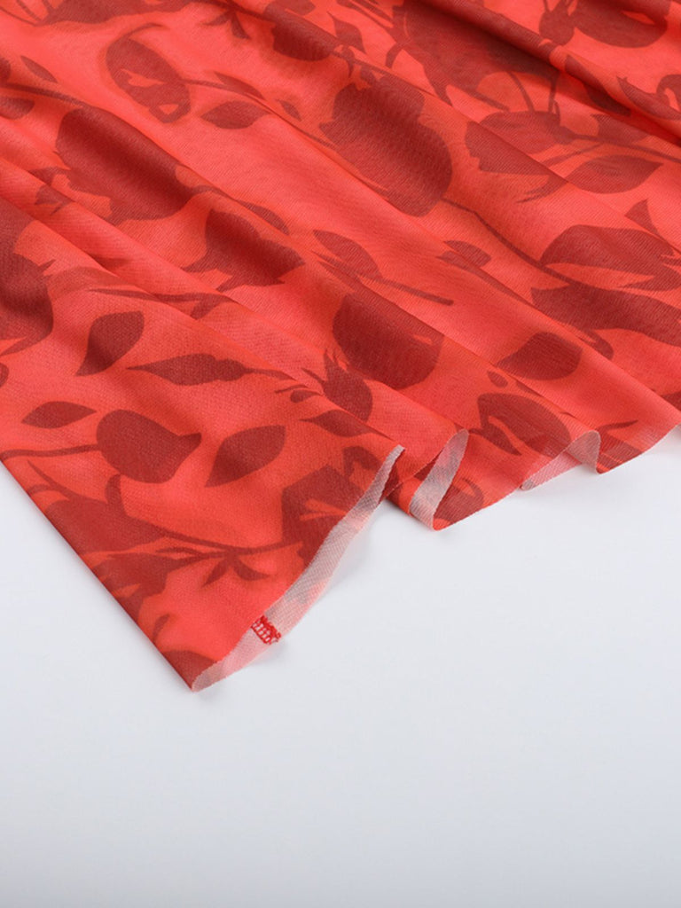 Robe rouge fleurs à bretelles spaghetti des années 1930