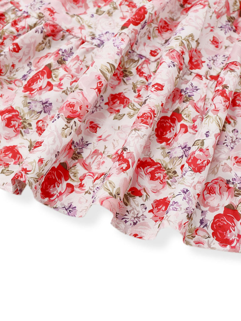 Robe manches bouffantes imprimé fleurs roses taille smockée des années 1950