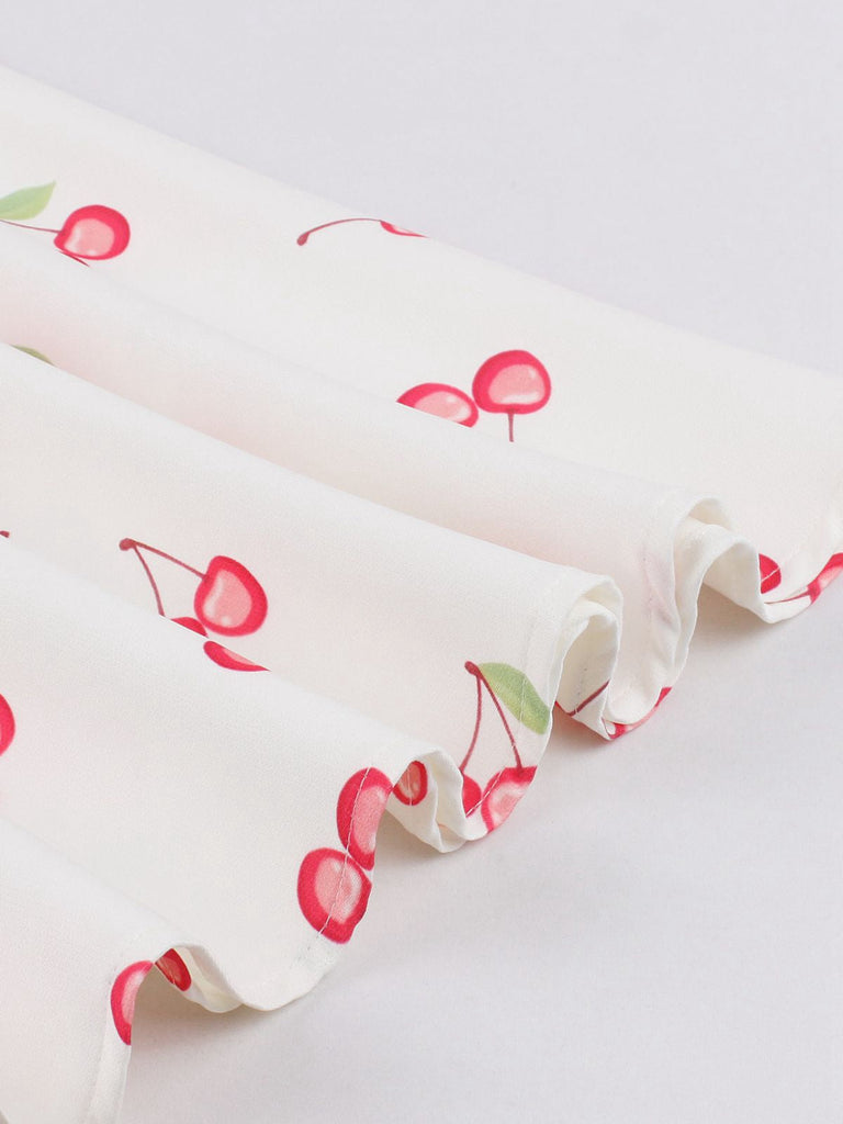 Robe cerise blanche col V nœud d'épaule des années 1950