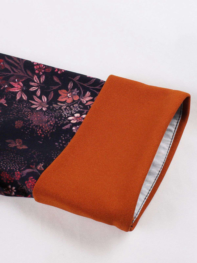 Robe patchwork fleurie rouge brique à revers des années 1950