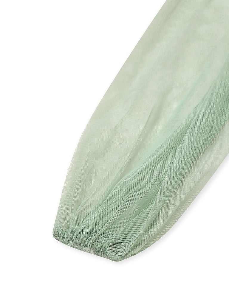 Robe verte en maille unie à volants manches illusion des années 1930