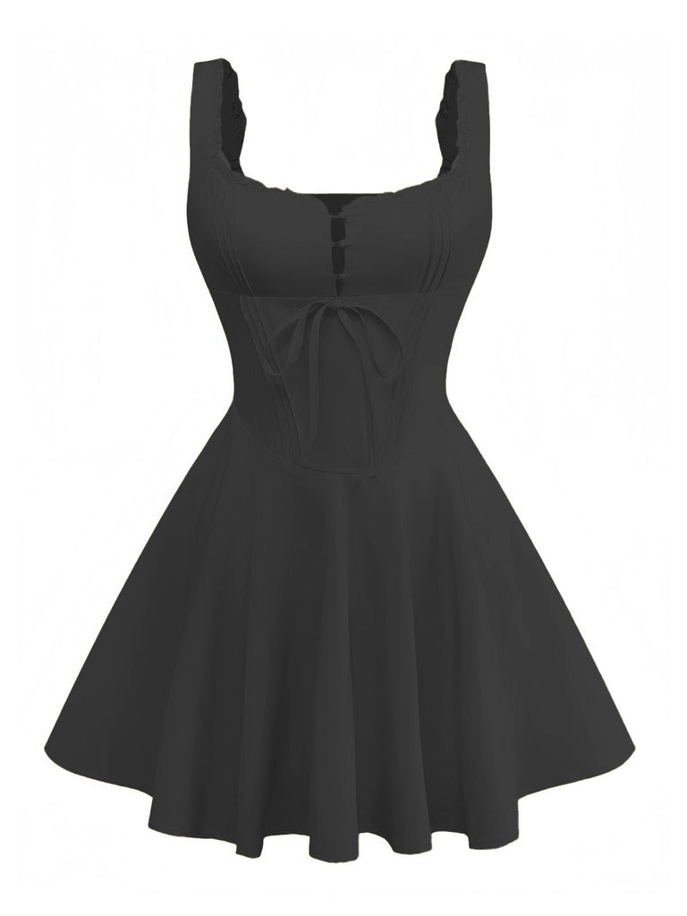 Robe patineuse dentelle à lacets et bretelles années 1960