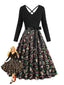 Robe noire à imprimé Noël col en V et dos croisé années 1950