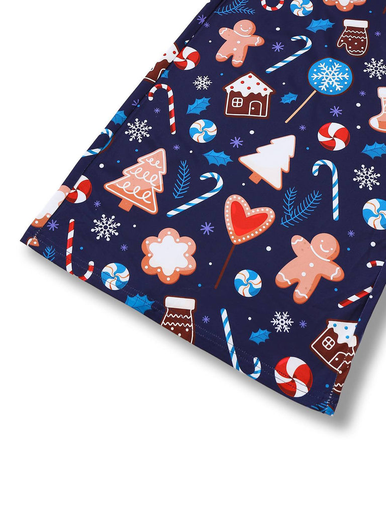 Combinaison à bretelles imprimée d'éléments de Noël bleus des années 1930