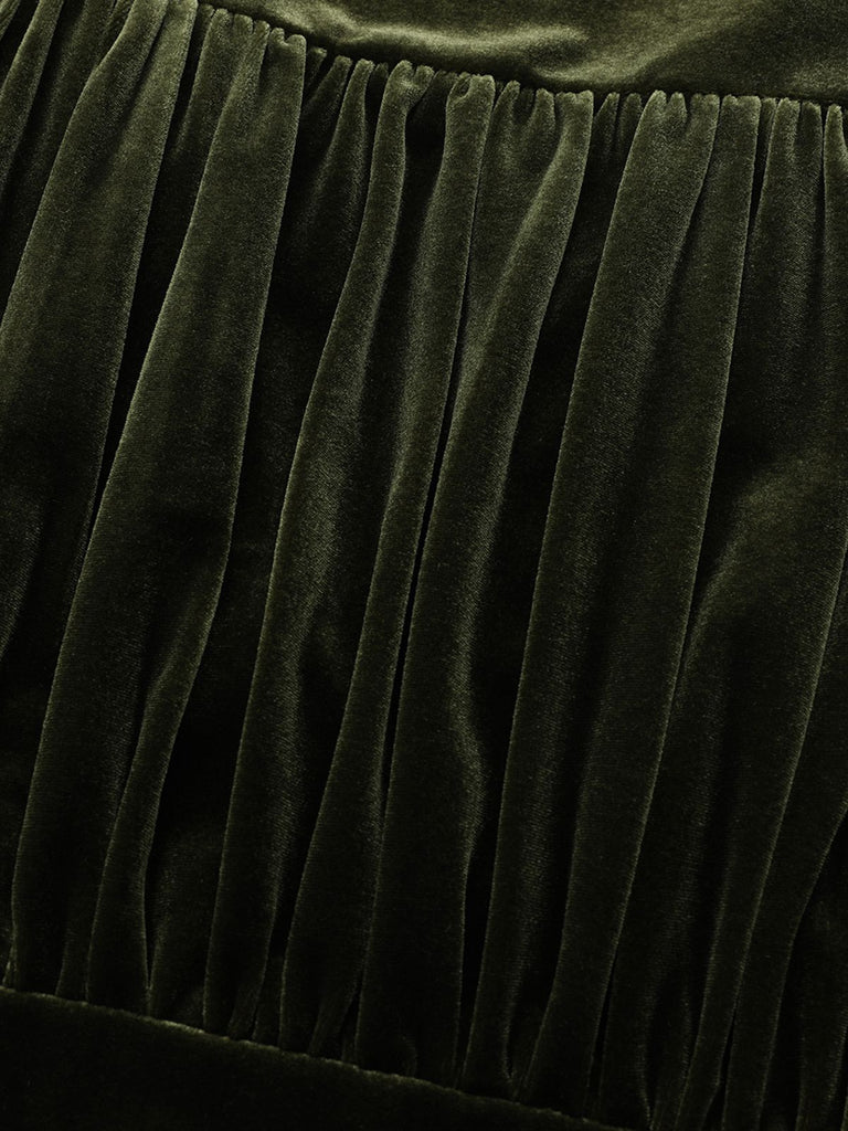 Robe verte en velours manches bouffantes col en V profond et froncées des années 1940