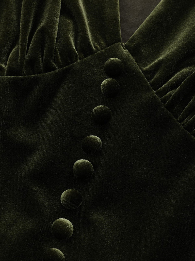 Robe verte en velours manches bouffantes col en V profond et froncées des années 1940