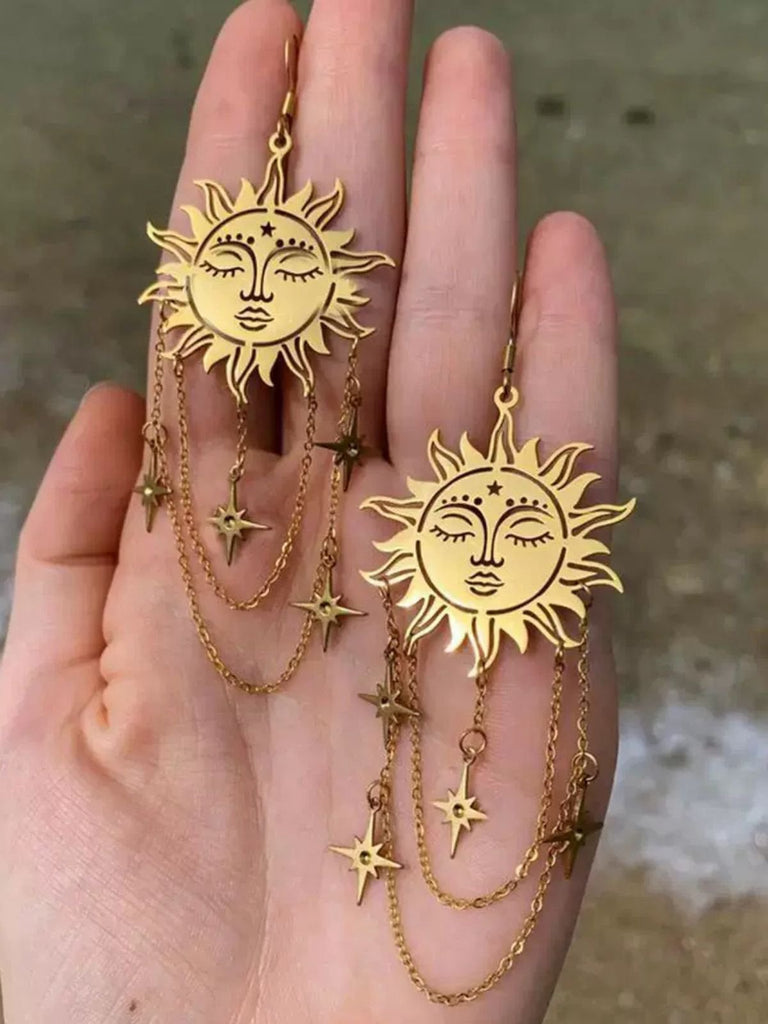 Boucles d'oreilles dorée visage de soleil de tarot avec chaîne