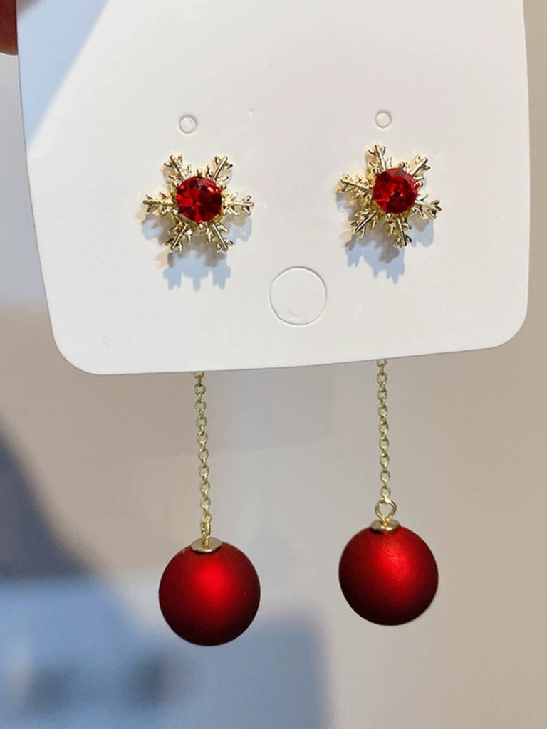 Boucles d'oreilles flocons de neige et boules de Noël rouges