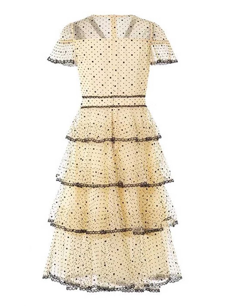 Robe ourlet superposé à volants en maille à pois et nœud années 1950
