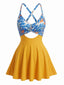 Robe de bain colorblock motif floral et découpes années 50