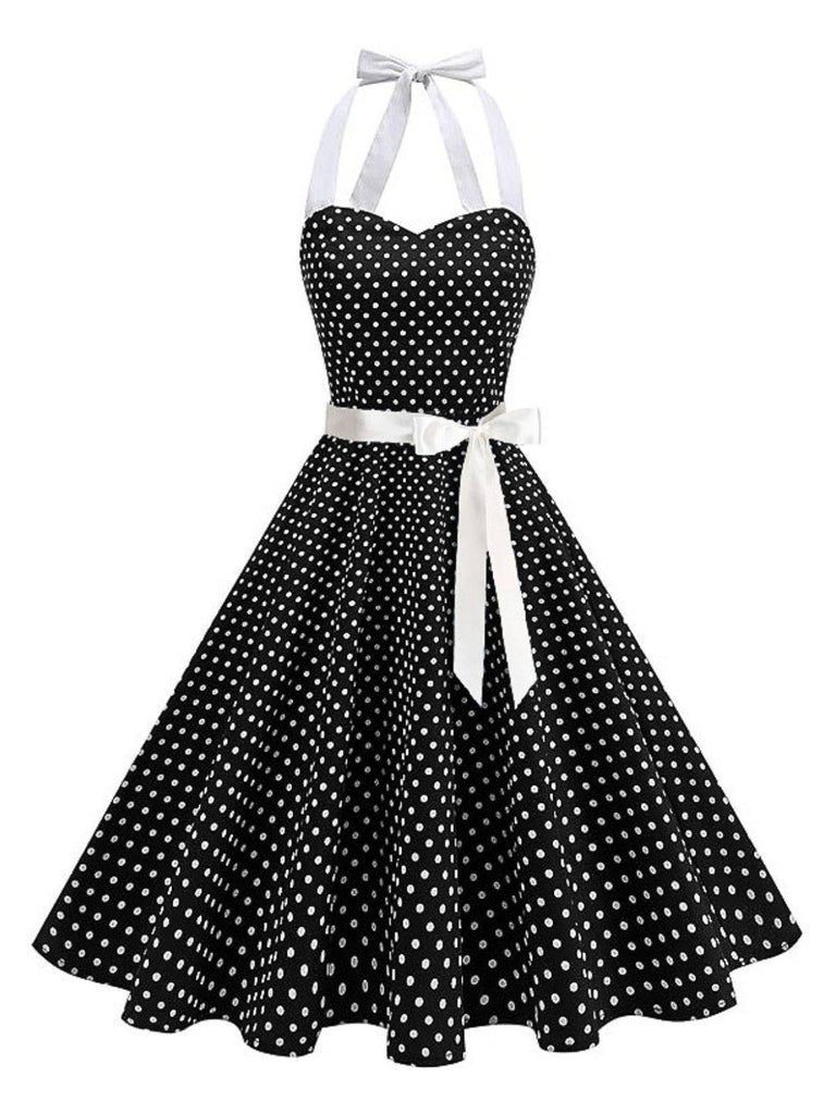 Robe swing ceinturée col halter à pois années 50