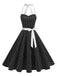 Robe swing ceinturée col halter à pois années 50