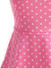 Robe swing ceinturée col halter à pois années 50