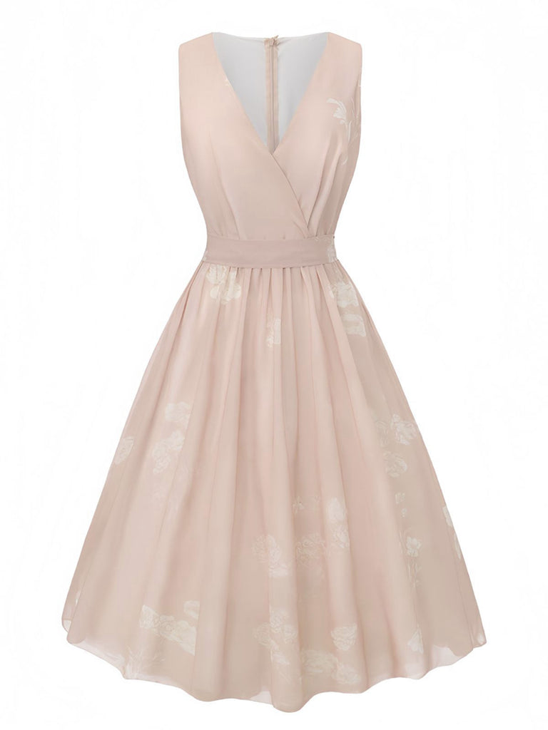 Robe rose sans manches à col V et ceinture florale années 1940