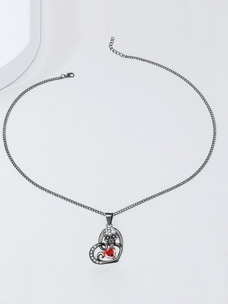 Collier avec pendentif en forme de cœur et de crâne pour Halloween