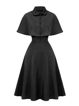 Robe noire capelet à revers uni des années 1950