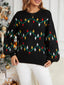 Pull en tricot noire à motifs de lumières de Noël années 1960