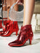 Bottines Chelsea à bout pointu et pompons métalliques