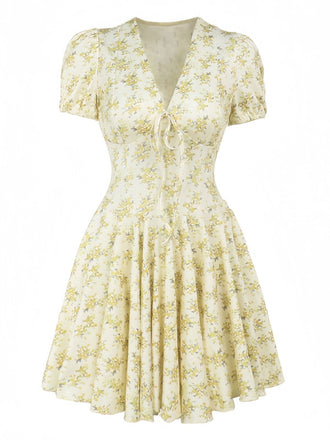 Robe jaune à fleurs et col en V manches bouffantes années 1960