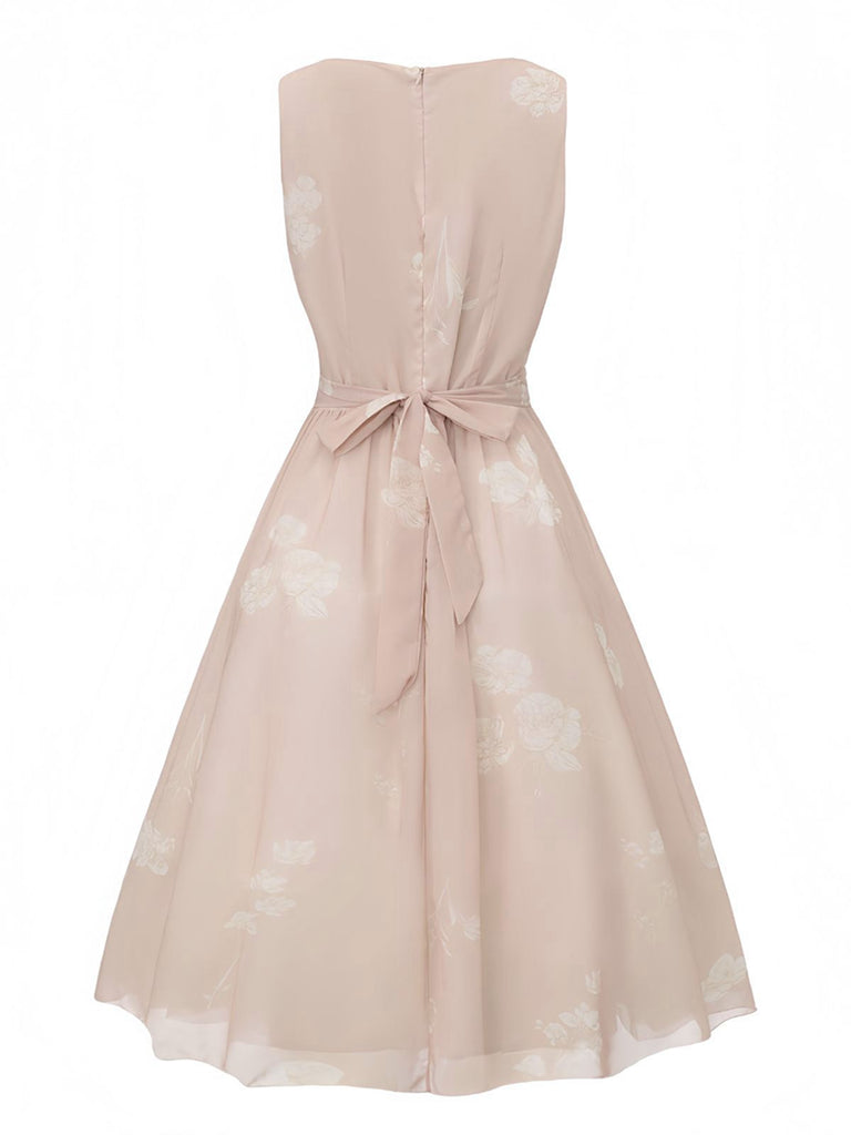 Robe rose sans manches à col V et ceinture florale années 1940