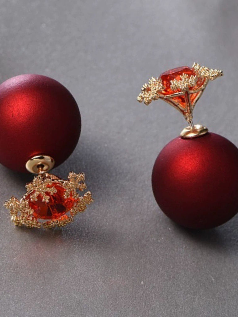 Boucles d'oreilles à flocon de neige avec pierres précieuses rouge de Noël