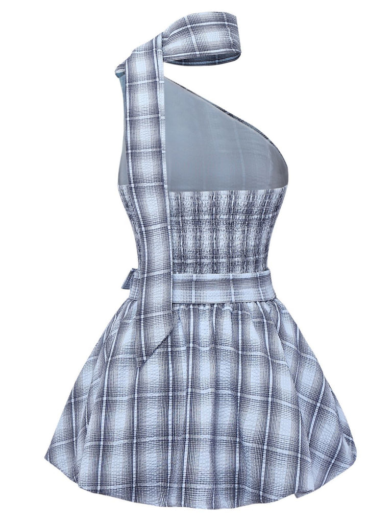 Plaid dress with a one-shoulder design on a white background