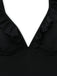 Black swimsuit with ruffled details on a white background