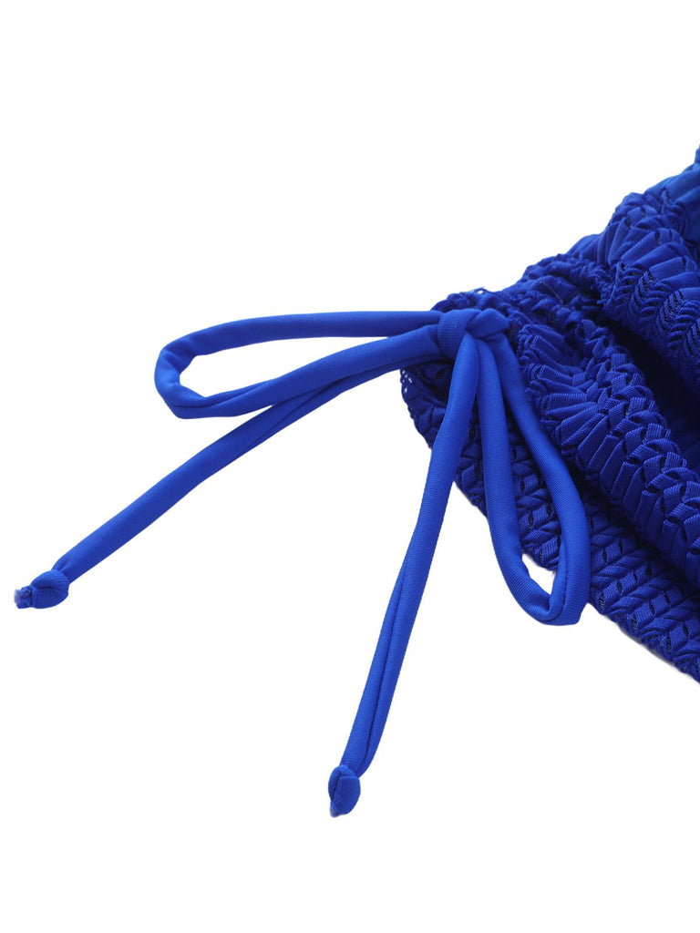 Close-up of blue shoelaces on a white background
