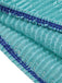 Close-up of teal fabric with blue stitching on a white background