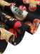 Robe noire de Noël motifs de pain d'épice et de cannes années 1950