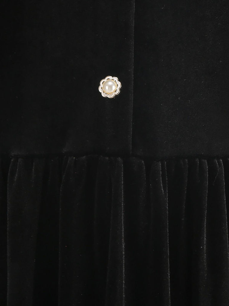 Robe noire en velours tricoté col et boutons nacrés années 1950