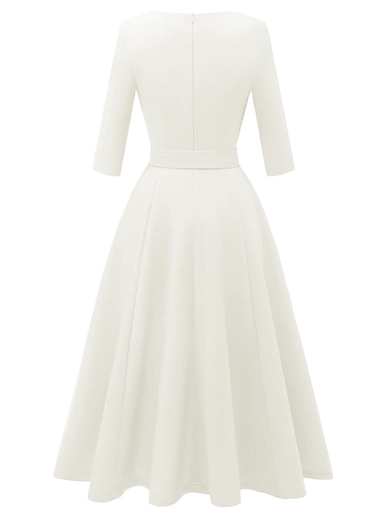 Robe trapèze manches trois-quarts à nœud papillon années 1940