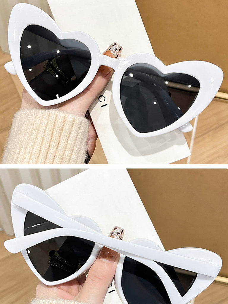 Lunettes de soleil à monture en forme de cœur incurvée