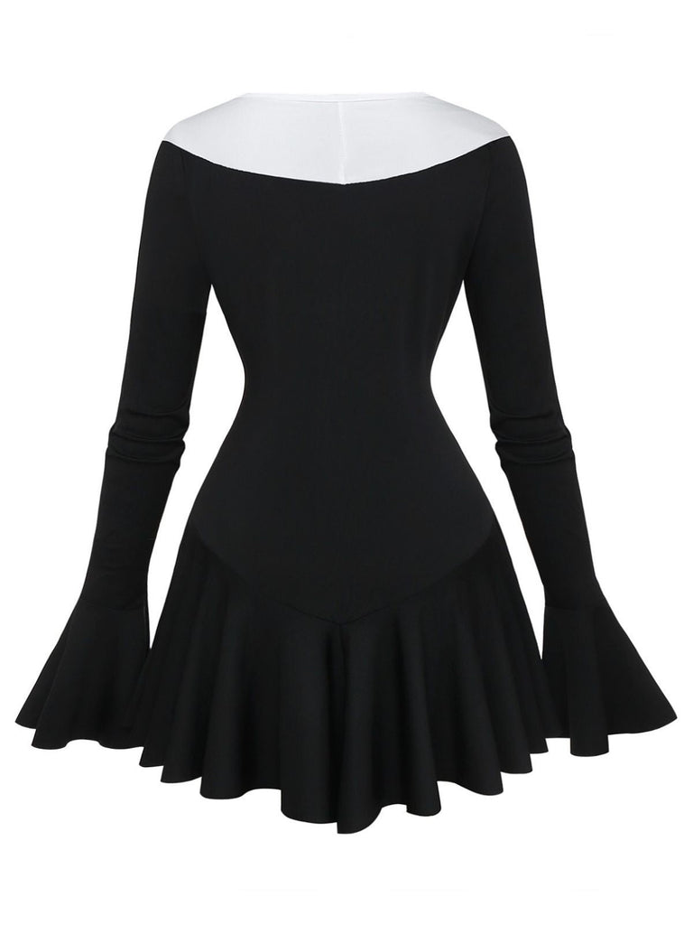Robe péplum à volants noire et blanche années 1960