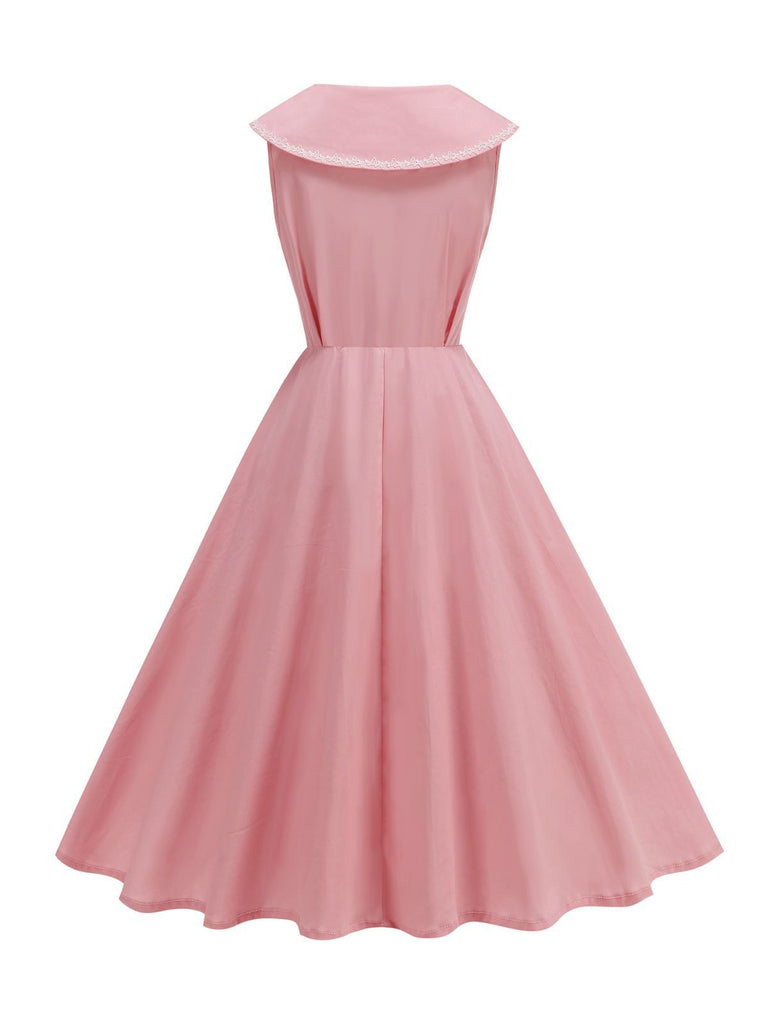 Robe sans manches col marin et nœud papillon couleur unie années 1950