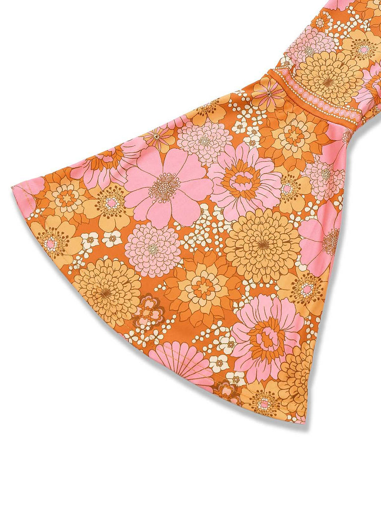 Robe fleurie orange hippie manches cloche des années 1960