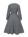 Robe noire à manches bouffantes et boutons nacrés style pied-de-poule années 1940