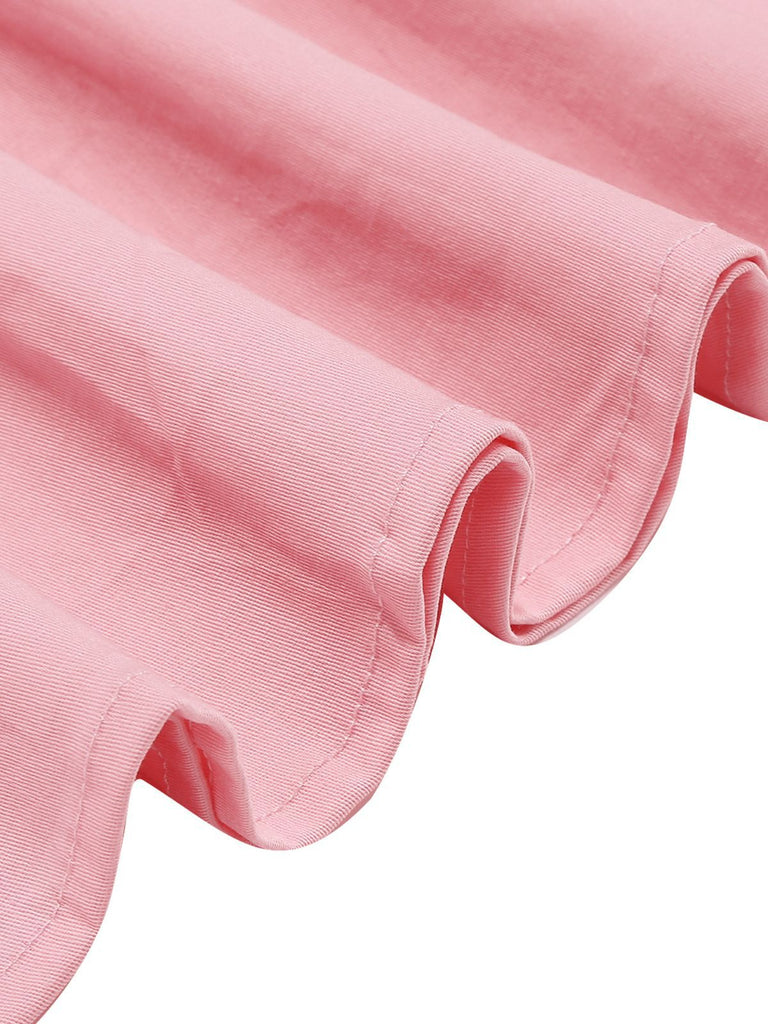 Robe sans manches col marin et nœud papillon couleur unie années 1950