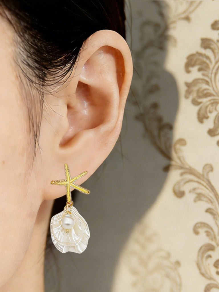 Boucles d'oreilles pendantes en coquillage d'étoile de mer doré perle