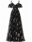 Robe noire fendue en tulle brodé de fleurs années 1970