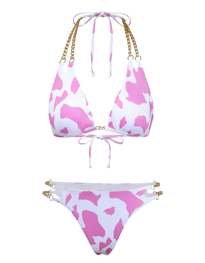 Vue de face du bikini orné d'un imprimé vache rose et blanc ludique.