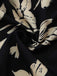 Black fabric with white floral patterns