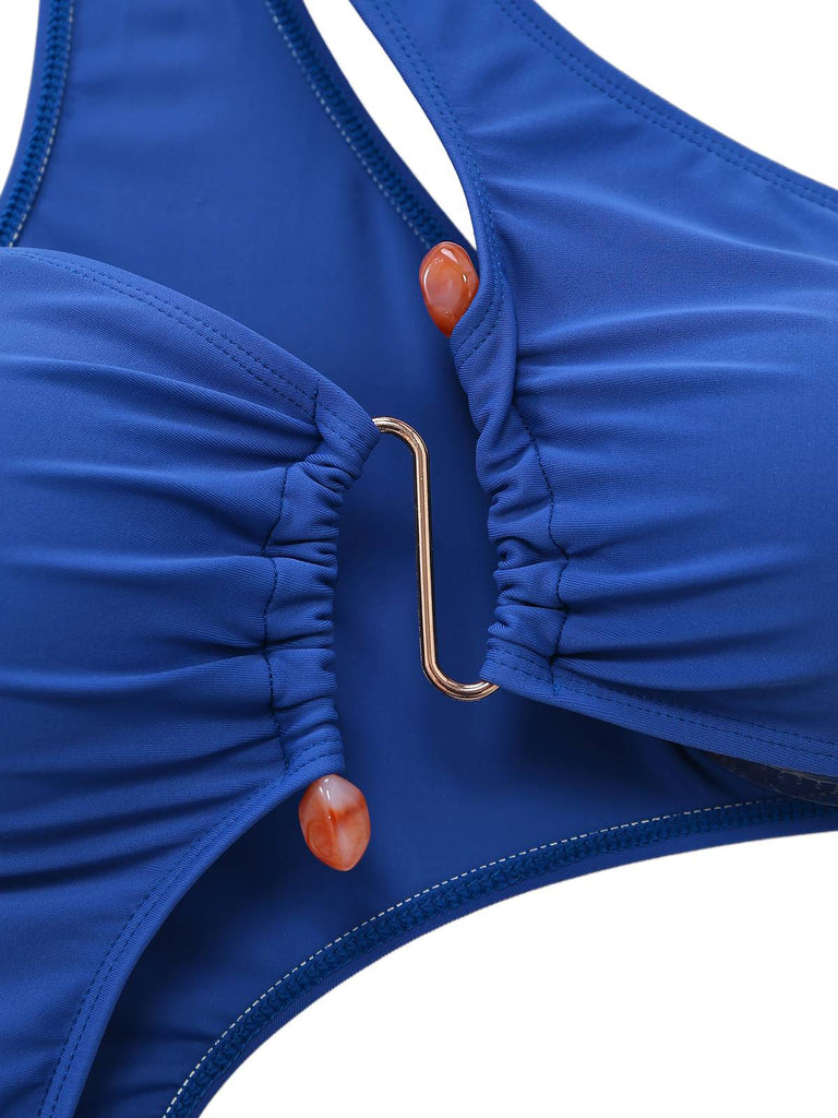 Blue one-shoulder cutout swimsuit collar detail showcasing refined neckline craftsmanship for luxury swimwear look
