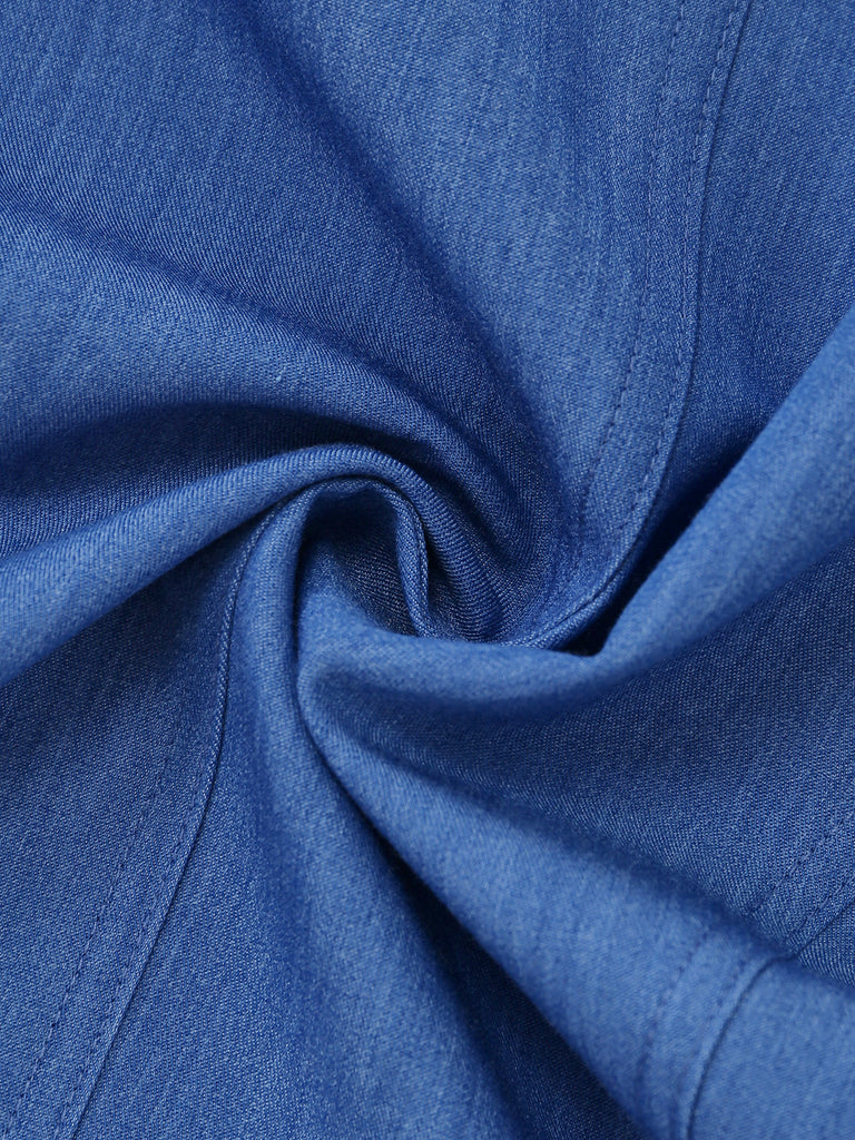 Close-up of blue fabric with folds