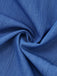 Close-up of blue fabric with folds