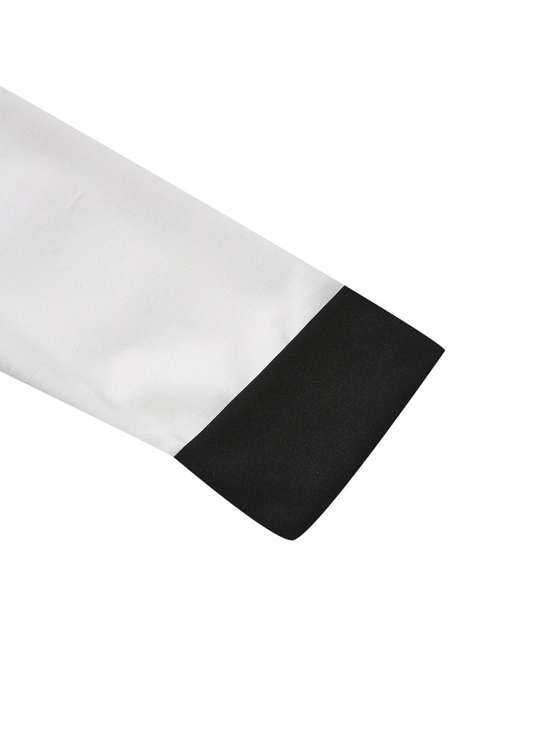 Robe boutonnée à col en V profond blanche et noire années 1940