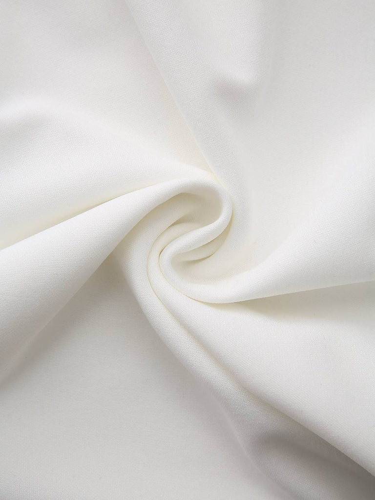 Robe boutonnée à col en V profond blanche et noire années 1940